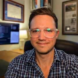 J Alex Baecher